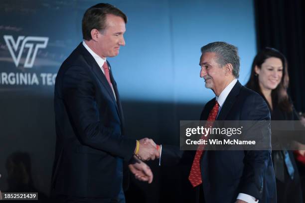 Monumental Sports & Entertainment CEO Ted Leonsis , shakes hands with Virginia Gov. Glenn Youngkin during an announcement of a new sports arena for...