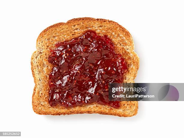 raspberry jam on toast - strawberry jam stock pictures, royalty-free photos & images