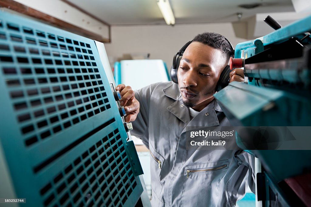 Worker at printing plant