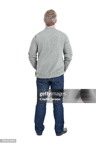 back of young adult in grey sweater - gray jeans stockfoto's en -beelden