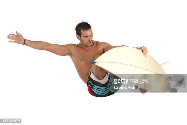 male surfer in action - unbalance stockfoto's en -beelden