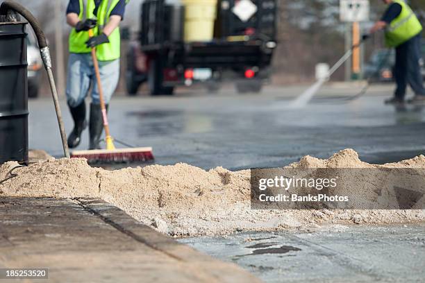 hazardous material accident scene cleanup - sweeping sidewalk stock pictures, royalty-free photos & images