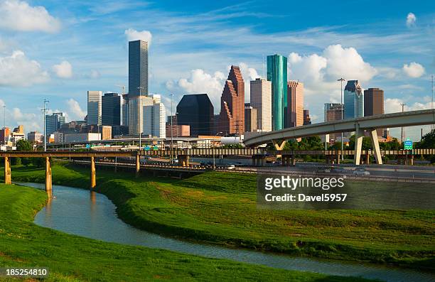 houston skyline, freeway, and river - houston texas stock pictures, royalty-free photos & images
