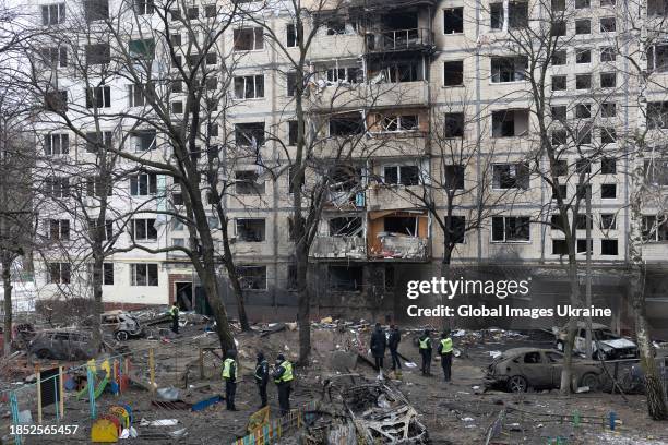 General view of the site where a ballistic missile's fragment fell near a residential building in Dniprovskyi district on December 13, 2023 in Kyiv,...