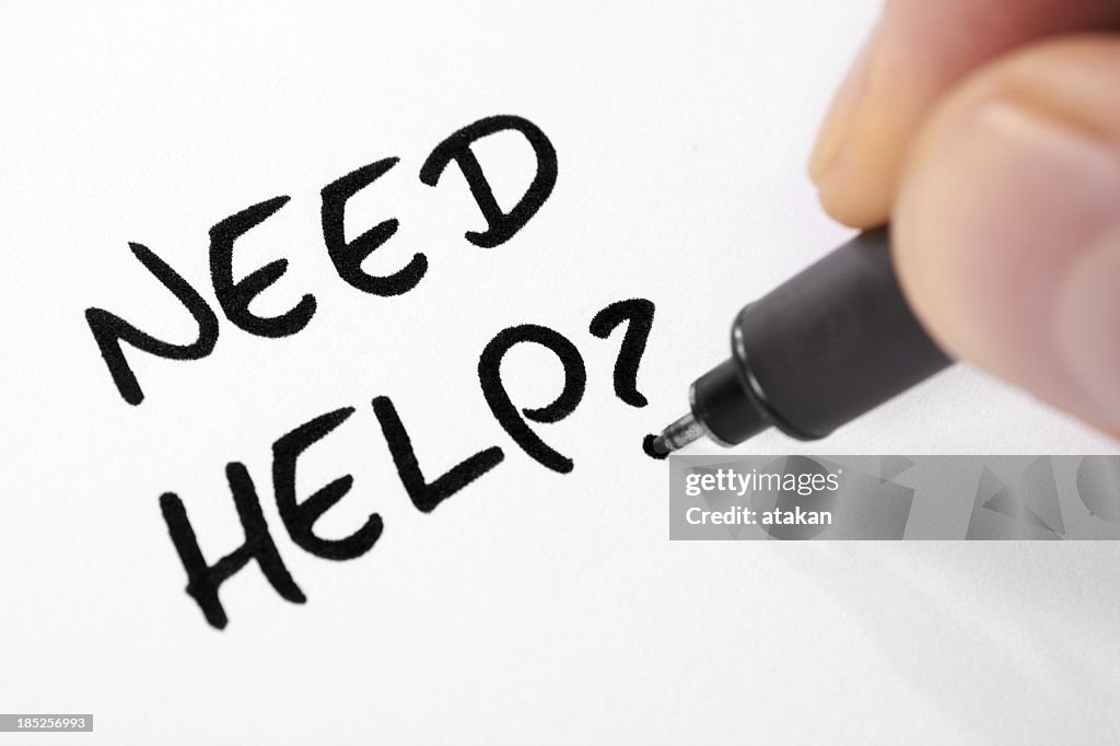 Person writing need help with a question mark in marker
