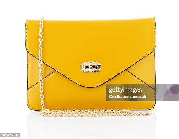 bolso amarillo - bolso dorado fotografías e imágenes de stock