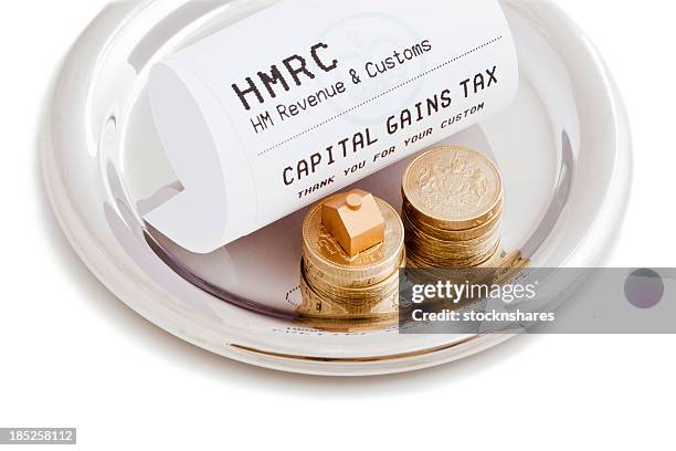 capital gains tax - tax preparation stock pictures, royalty-free photos & images