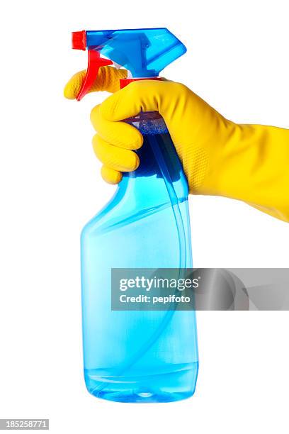 hand in protective glove holding cleaning spray bottle - spray bottle stock pictures, royalty-free photos & images