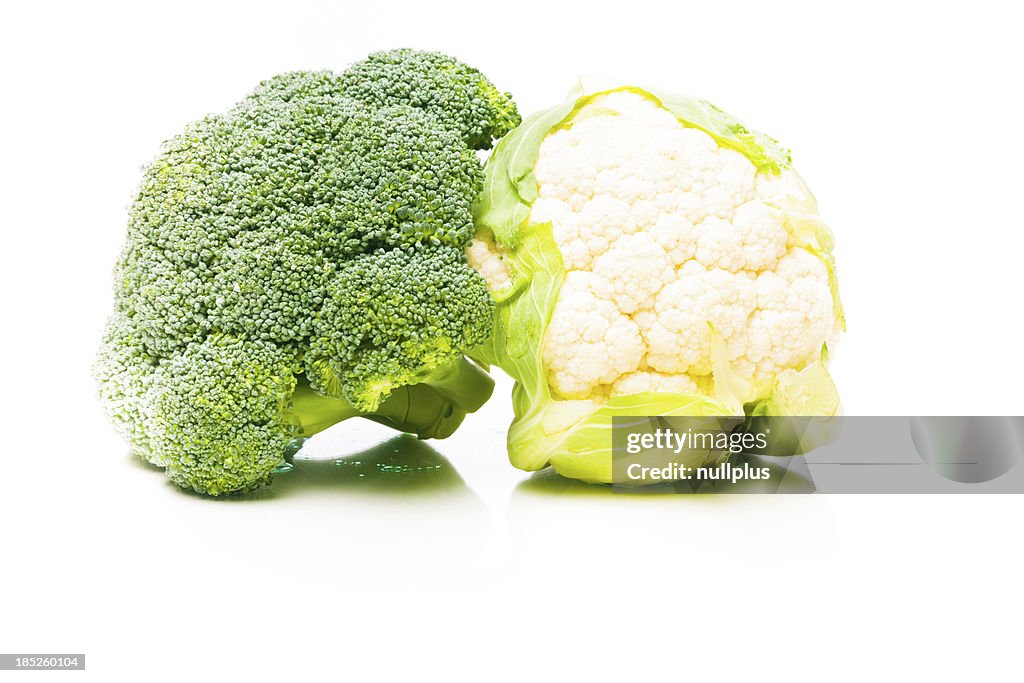 Broccoli and cauliflower on white