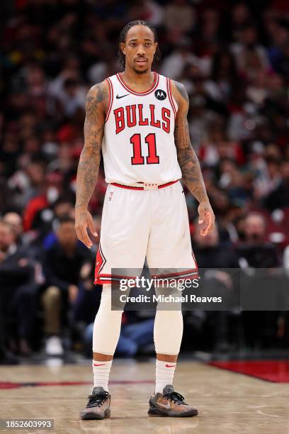 DeMar DeRozan of the Chicago Bulls looks on against the Denver Nuggets during the second half at the United Center on December 12, 2023 in Chicago,...