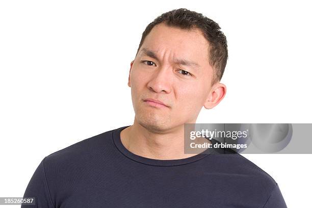 frowning asian man - frustration man stock pictures, royalty-free photos & images