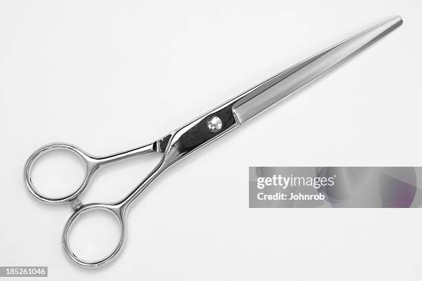 hair cutting scissors - kappersschaar stockfoto's en -beelden