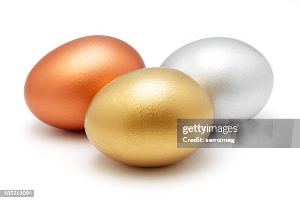 golden silber und bronze-ei - easter egg colour isolated stock-fotos und bilder