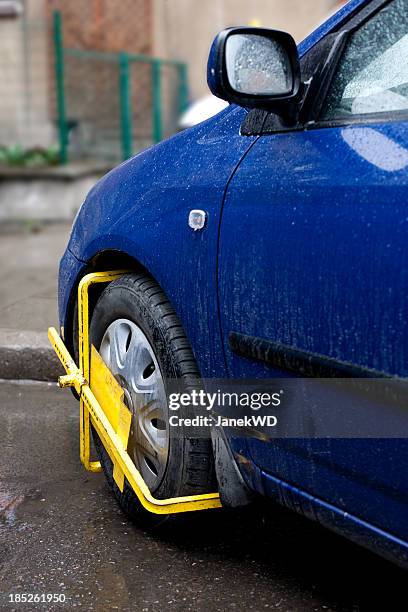 craped car wheel in restrcted area - car boot stock pictures, royalty-free photos & images