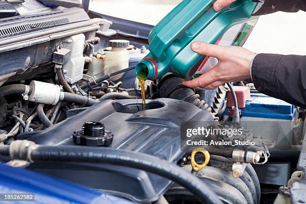 oil change - engine oil stock pictures, royalty-free photos & images