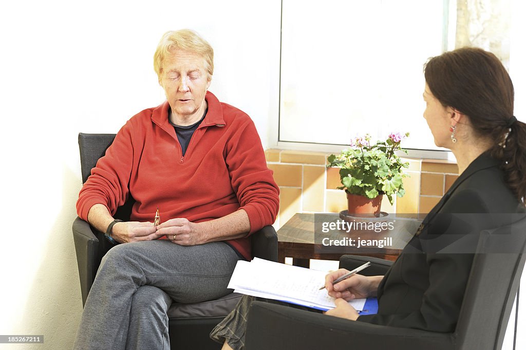 Sad woman in counselling session