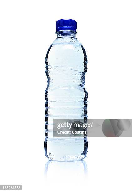 backlit plastic water bottle. isolated on white. - lots of bottles stockfoto's en -beelden