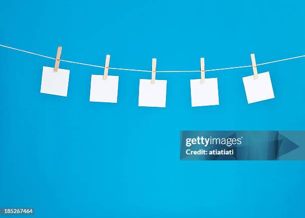 hanging blank note pads - clothes peg isolated stock pictures, royalty-free photos & images