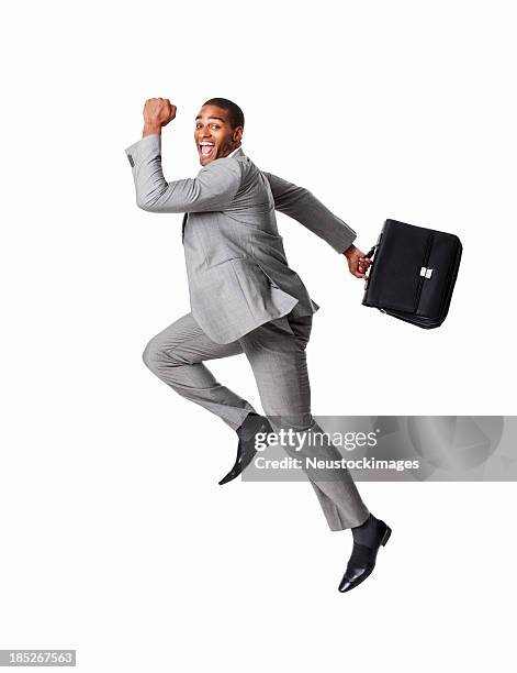 businessman in a rush - isolated - businessman running stock pictures, royalty-free photos & images