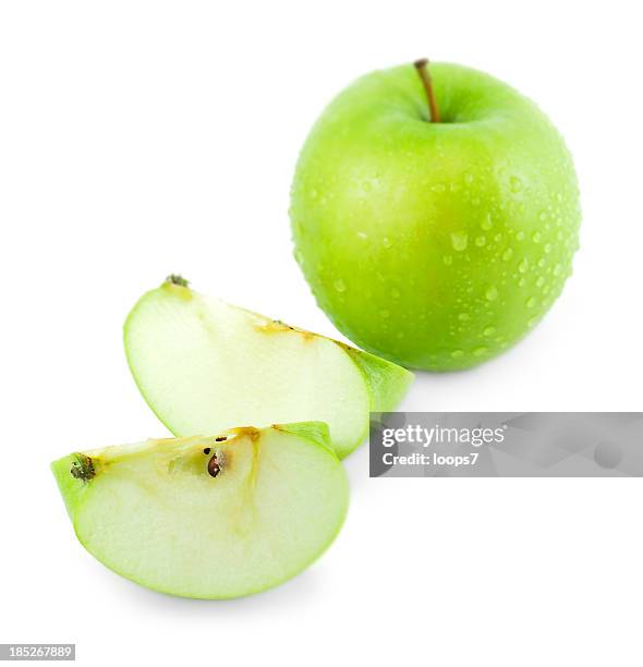 apple - green apple slices stock pictures, royalty-free photos & images