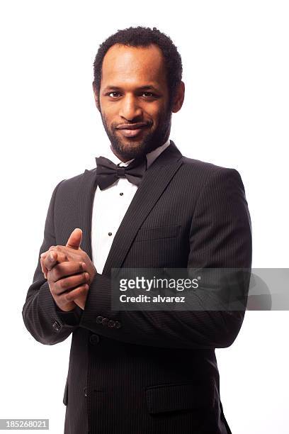 young man with a  bow tie - dinner jacket stock pictures, royalty-free photos & images