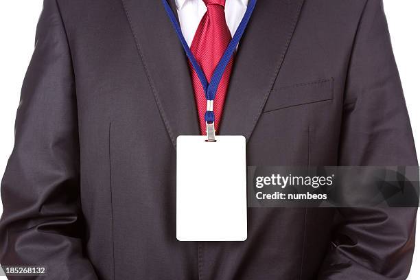 front shot of a businessman wearing a blank name tag - lanyard stockfoto's en -beelden