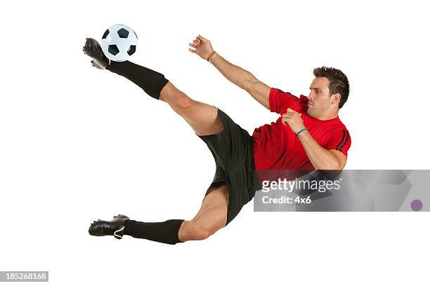man playing soccer - soccer player on white stock pictures, royalty-free photos & images
