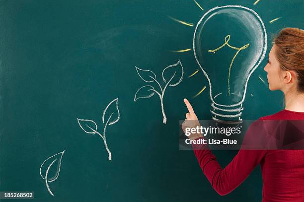 green energy concept - womans fingers side view drawing stock pictures, royalty-free photos & images