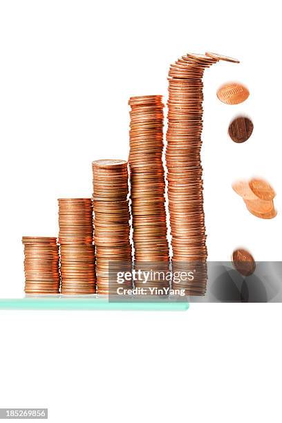 managing investment and financial risk- coins falling off the chart - us penny stock pictures, royalty-free photos & images