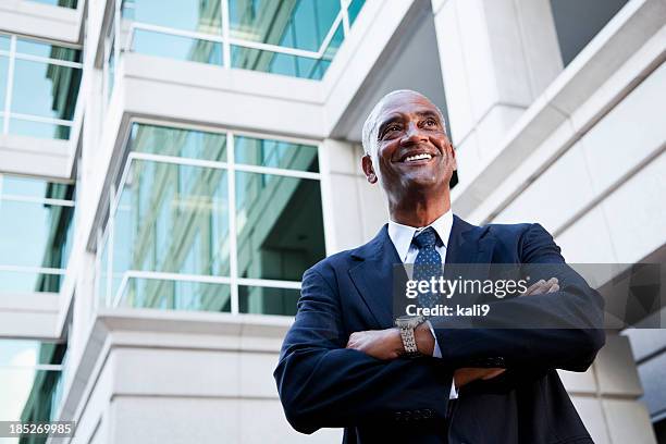 african american businessman outside office building - portrait man building stock pictures, royalty-free photos & images