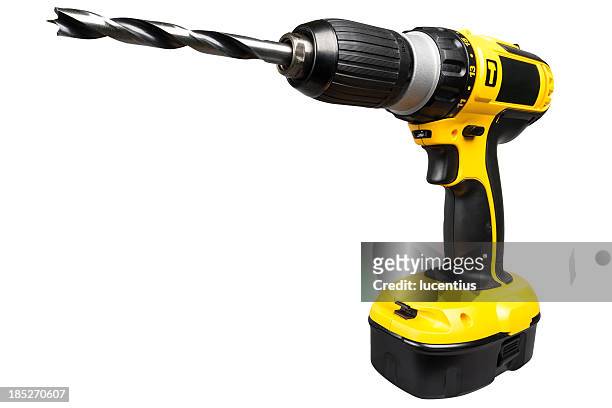 cordless electric drill isolated on white - drill stockfoto's en -beelden