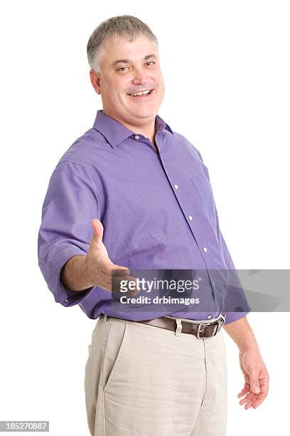 happy man offers handshake - purple shirt stock pictures, royalty-free photos & images
