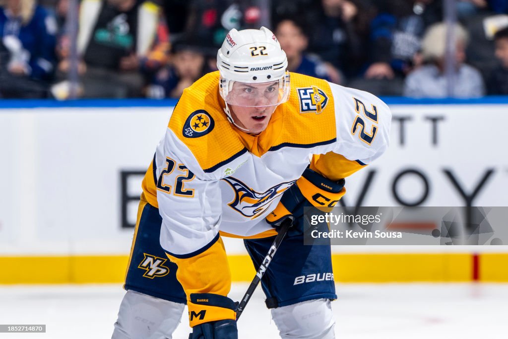 Toronto Predators Tyson Barrie of the Nashville Predators sets for a face-off against ...