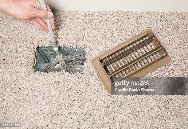 residential hvac duct cleaning with a power brush - home furnace stock pictures, royalty-free photos & images