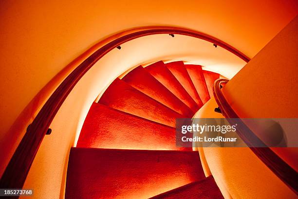 stairs leading down - spiral staircase stock pictures, royalty-free photos & images