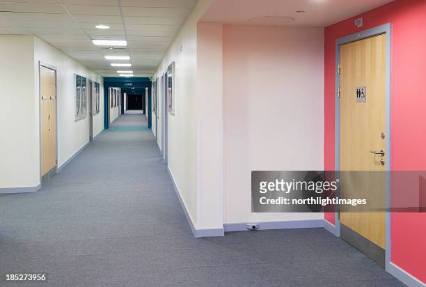 modern secondary school corridor - public restroom door stock pictures, royalty-free photos & images