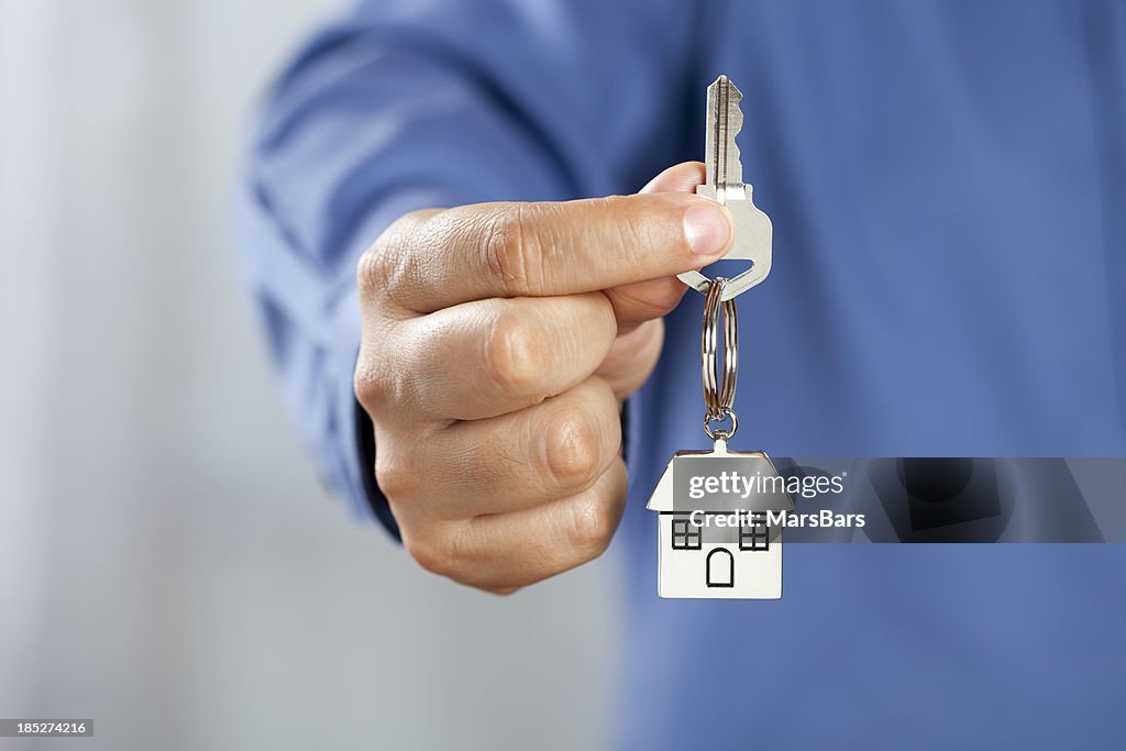 Man giving house keys