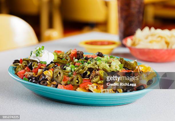 nachos - mexican food plate stock pictures, royalty-free photos & images