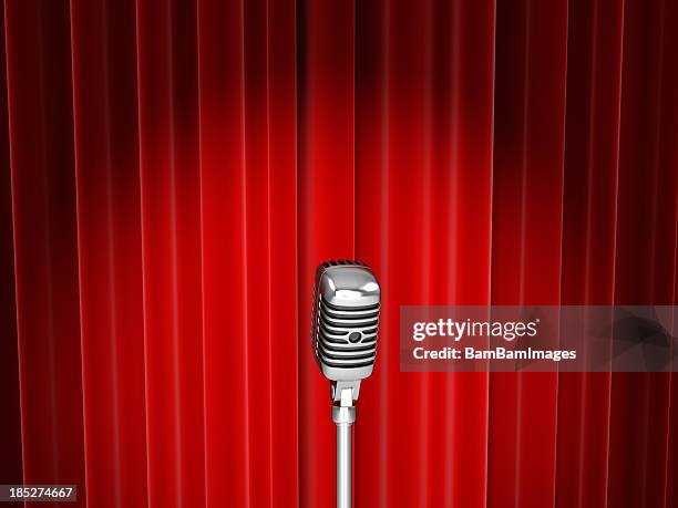 vector of microphone with spotlight against red curtain - red curtain stockfoto's en -beelden