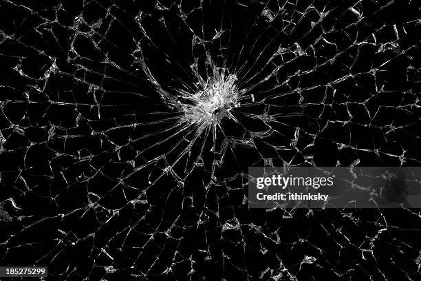 cracked glass - breaking window stockfoto's en -beelden