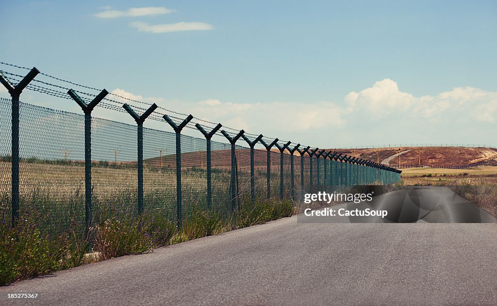 Road next to a fence