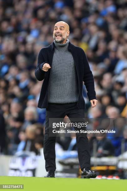 Manchester City manager Pep Guardiola gestures during the Premier League match between Manchester City and Crystal Palace at Etihad Stadium on...