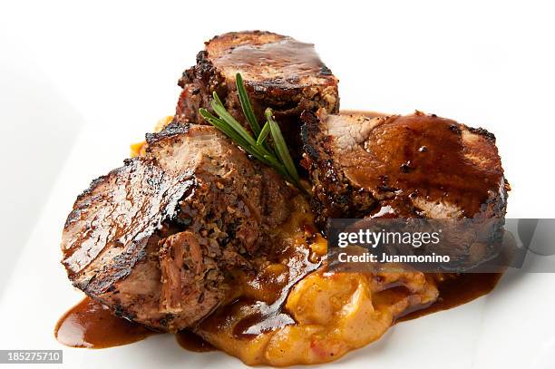 braised pork tenderloins - tenderloin stock pictures, royalty-free photos & images