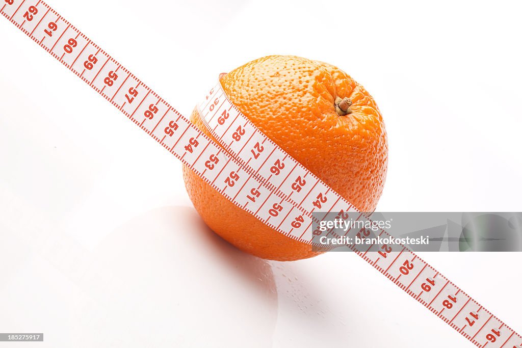 Orange with measurement tape