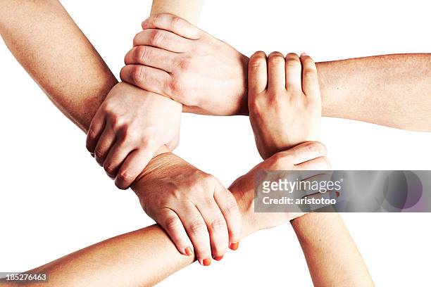 hands holding each other in a circle - sea of hands stock pictures, royalty-free photos & images