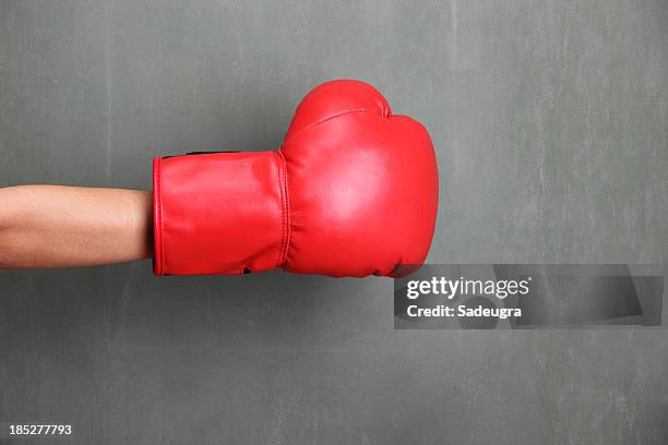 ready to fight - boxing glove coloured background stock pictures, royalty-free photos & images