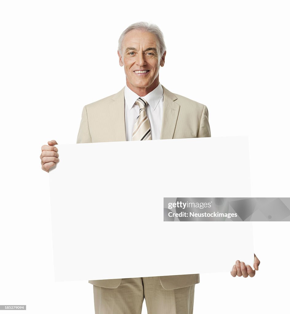 Mature Businessman Holding Blank Sign - Isolated