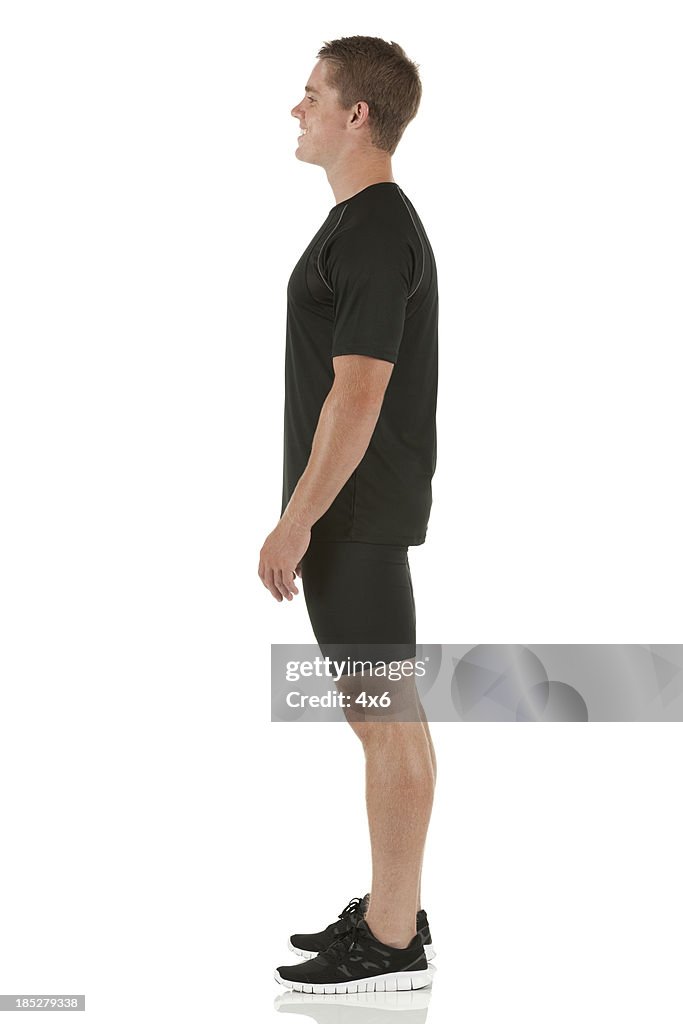 Profile of a male athlete standing