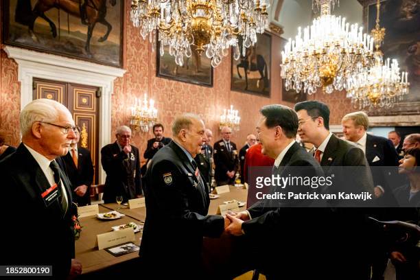 King Willem-Alexander of The Netherlands and President of the Republic of Korea Yoon Suk Yeo during a meeting with Korean War Veterans at the Royal...