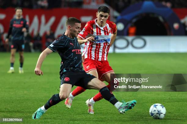 Sergio Gomez of Manchester City controls the ball whilst under pressure from Kosta Nedeljkovic of FK Crvena zvezda during the UEFA Champions League...